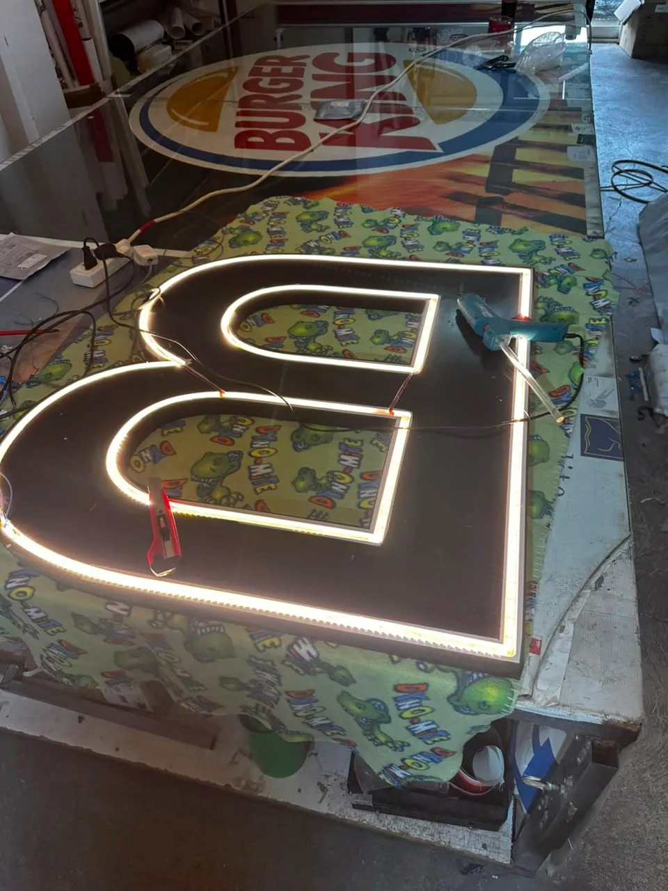 LED channel letter being built in the workshop