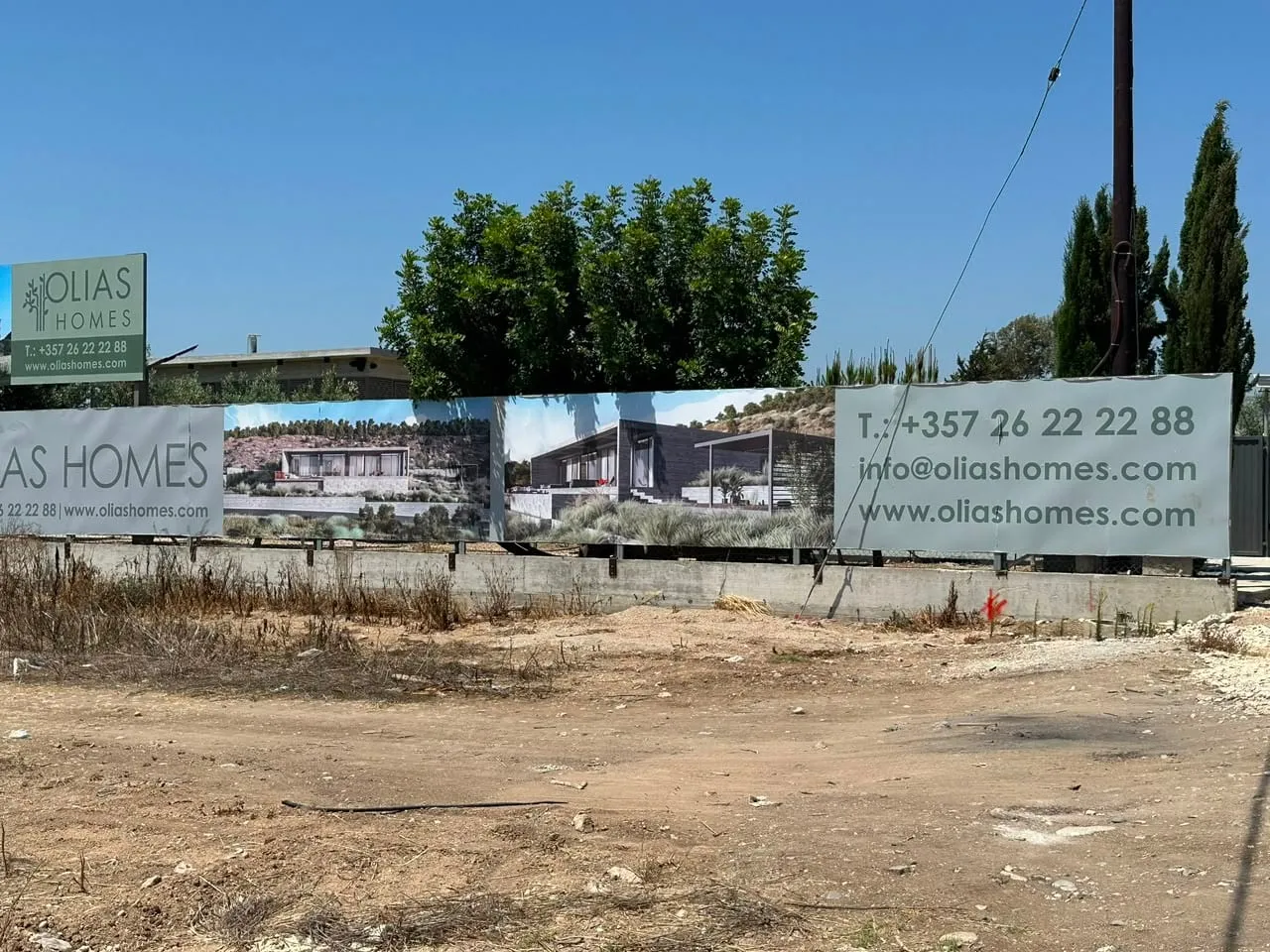 Olias Homes hoarding by Focus Signs